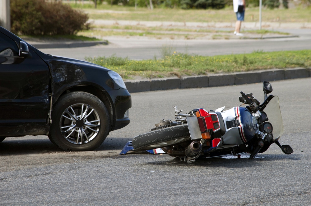 Motorcycle accident lawyer in Queens, NY, helping an injured rider maximize settlement compensation.